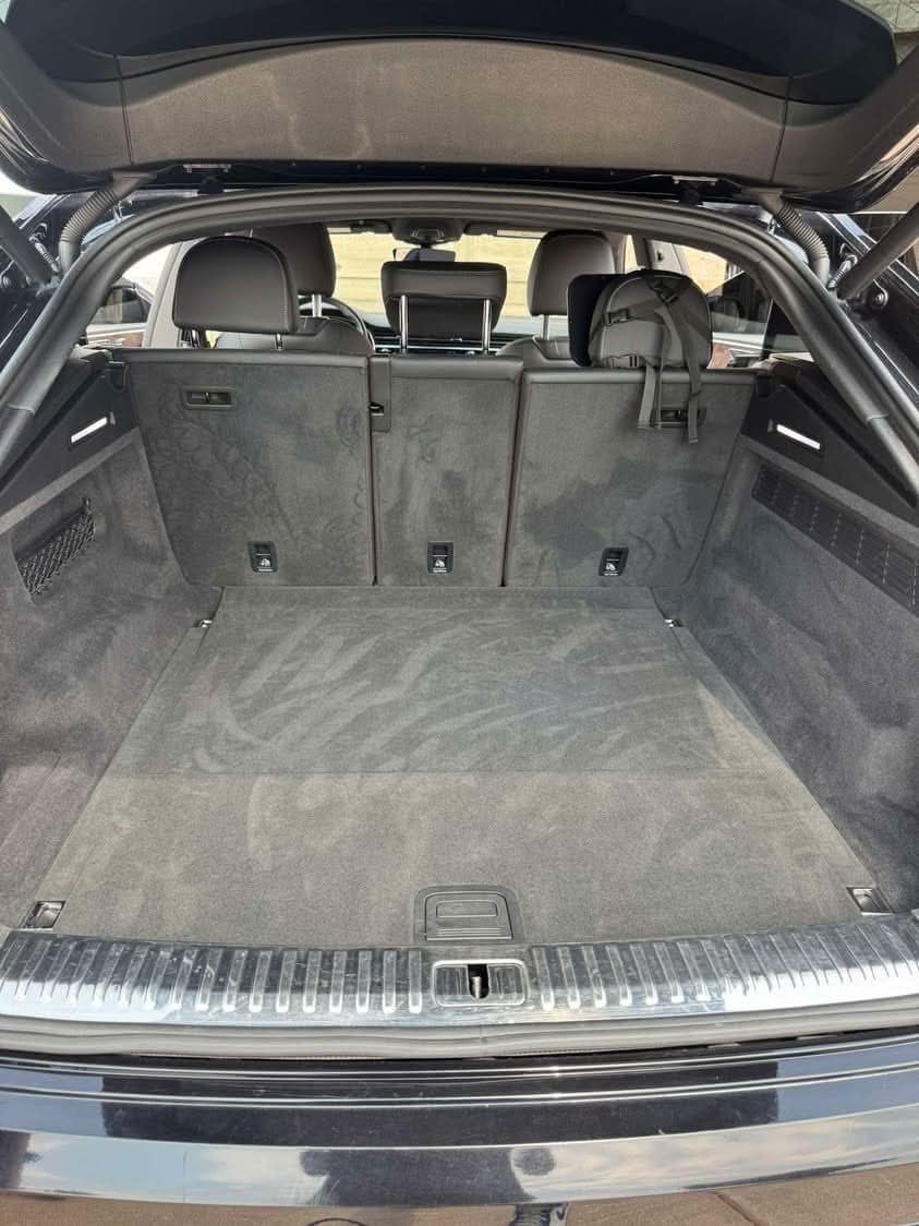 Vacuumed Audi Q8 trunk with clean carpet